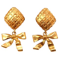 Chanel Bow Dangling Earrings