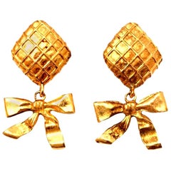 Chanel Bow Dangling Earrings