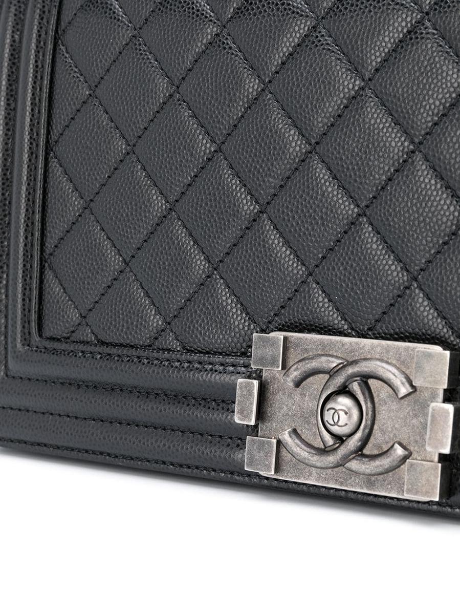 The Chanel Boy Bag will become your staple. Featuring a silver tone strap and the unmistakable Chanel diamond quilted finish. It is the perfect size to fit the essentials in. 

Colour: Black

Composition: Leather

Dimensions: Width: 25cm, Depth: