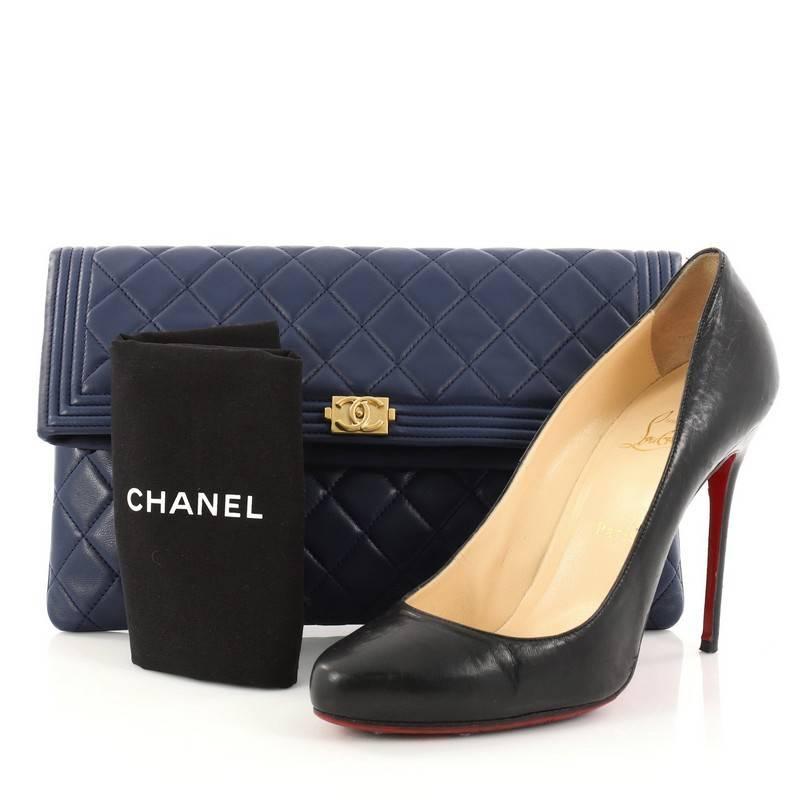 This authentic Chanel Boy Beauty CC Clutch Quilted Lambskin is a stylish clutch perfect for your everyday use. Crafted from supple blue lambskin leather, this oversized clutch features Chanel's diamond stitching, iconic Boy CC logo, and gold-tone