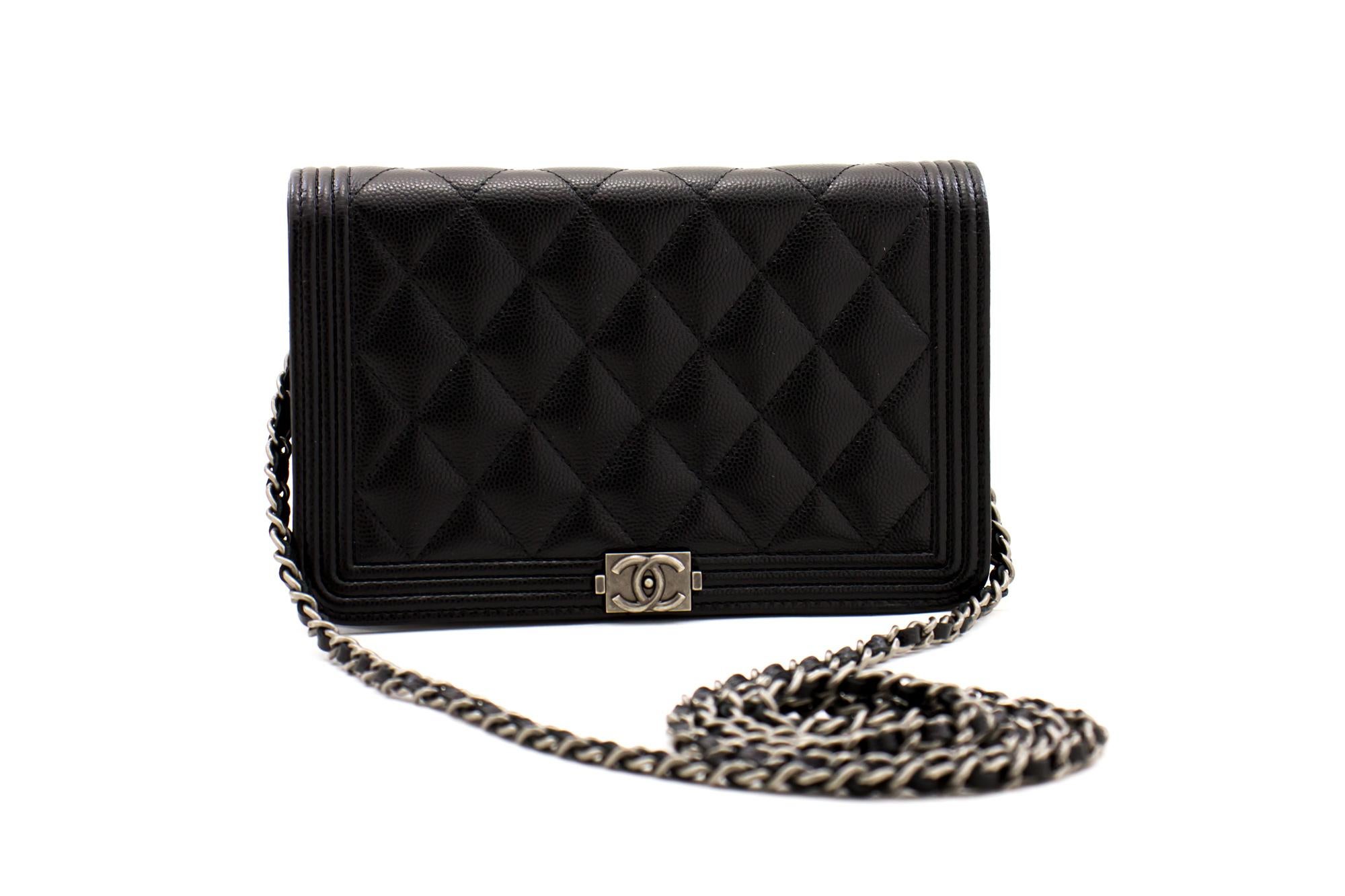An authentic CHANEL Boy Black Caviar Flap Wallet On Chain WOC Shoulder Bag. The color is Black. The outside material is Leather. The pattern is Solid. This item is Contemporary. The year of manufacture would be 2018.
Conditions & Ratings
Outside