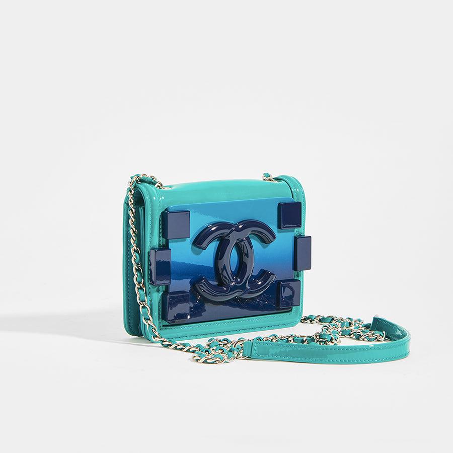 Does it get more iconic than a Chanel flap bag? We think not. These classic handbags are still the most wanted of all time for a reason. This medium turquoise matelasse ram leather version with signature diamond quilting features a single front flap