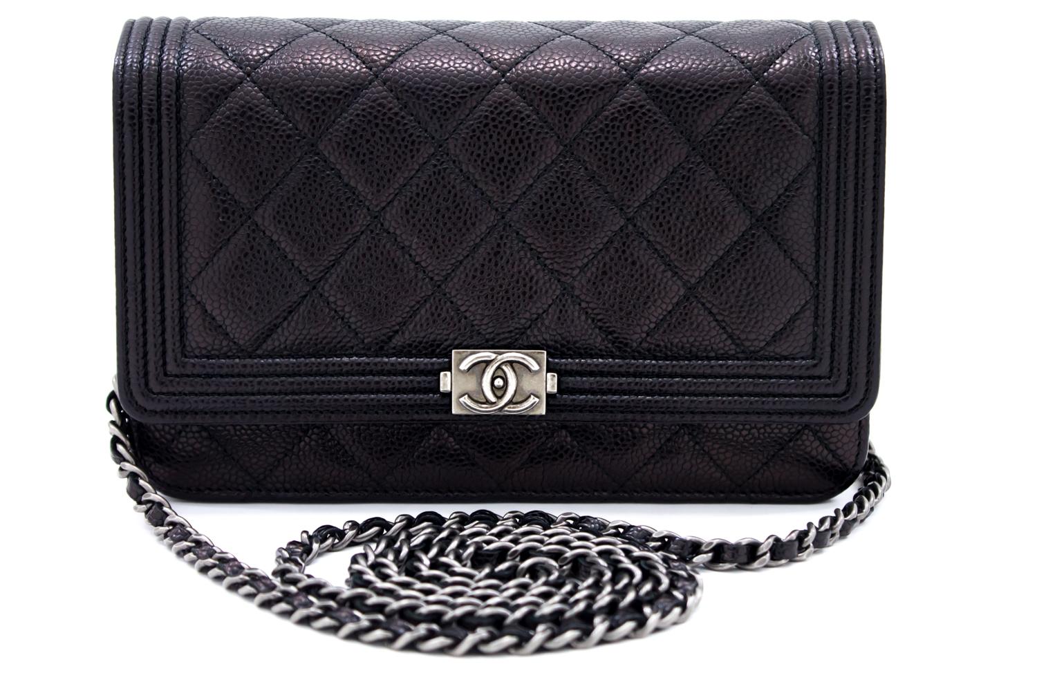 An authentic CHANEL Boy Caviar Black Wallet On Chain WOC Shoulder Bag Quilted. The color is Black. The outside material is Leather. The pattern is Solid. This item is Contemporary. The year of manufacture would be 2014.
Conditions & Ratings
Outside