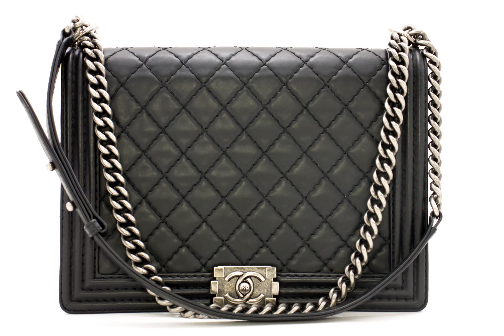 An authentic CHANEL Boy Chain Shoulder Bag Black Quilted Flap Leather Crossbody. The color is Black. The outside material is Leather. The pattern is Solid. This item is Contemporary. The year of manufacture would be 2013.
Conditions &