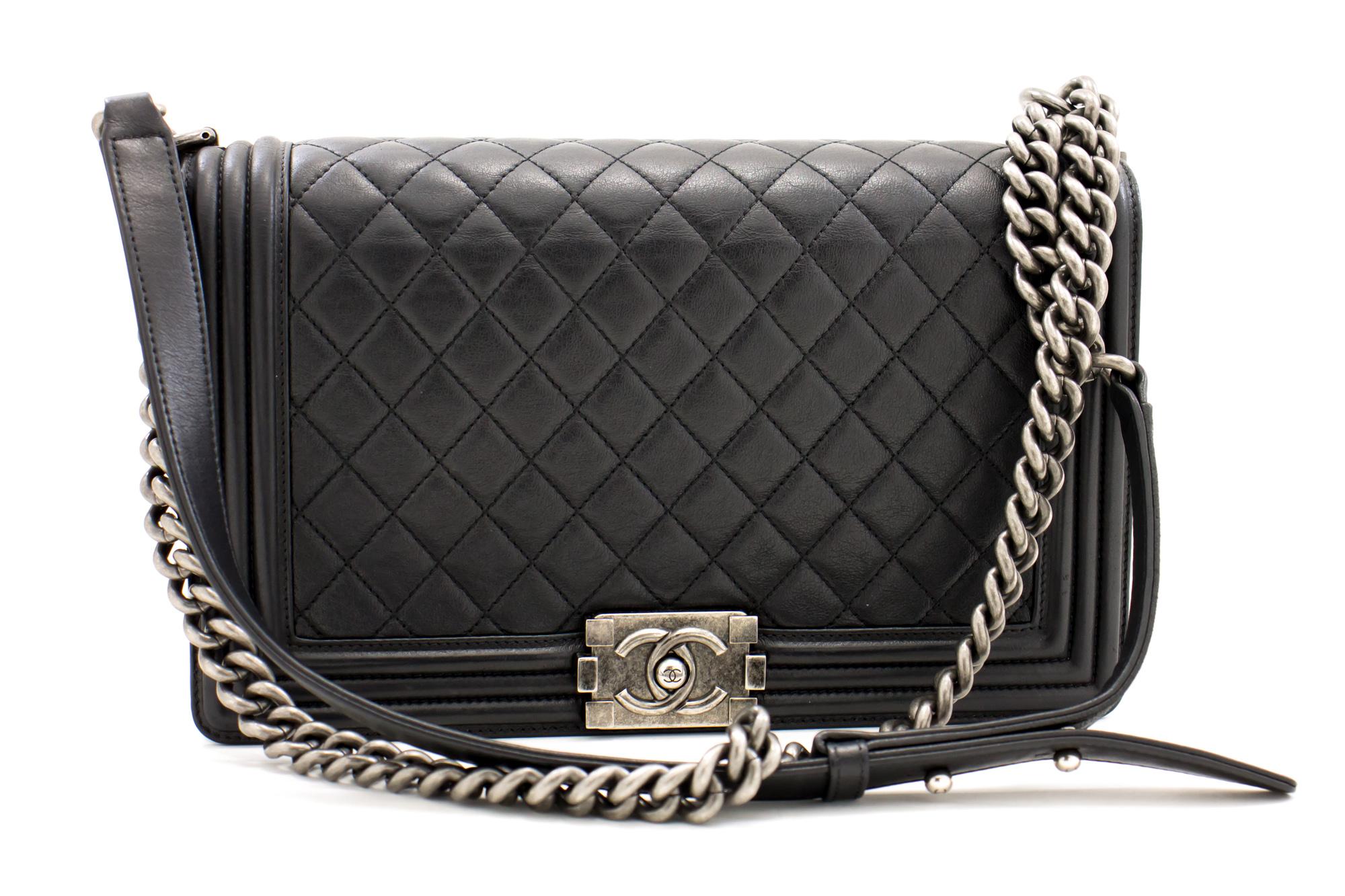 An authentic CHANEL Boy Chain Shoulder Bag Black Quilted Calfskin Leather Flap. The color is Black. The outside material is Leather. The pattern is Solid. This item is Contemporary. The year of manufacture would be 2014.
Conditions & Ratings
Outside
