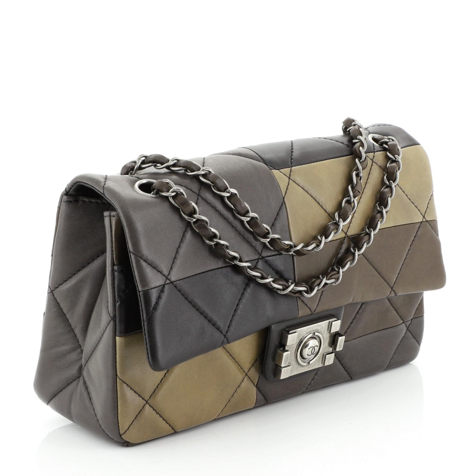 This Chanel Boy Clasp Flap Bag Patchwork Quilted Lambskin Medium, crafted in multicolor quilted lambskin leather, features woven-in leather chain strap, signature Boy clasp closure and aged silver-tone hardware. Its Boy push-lock closure opens to a