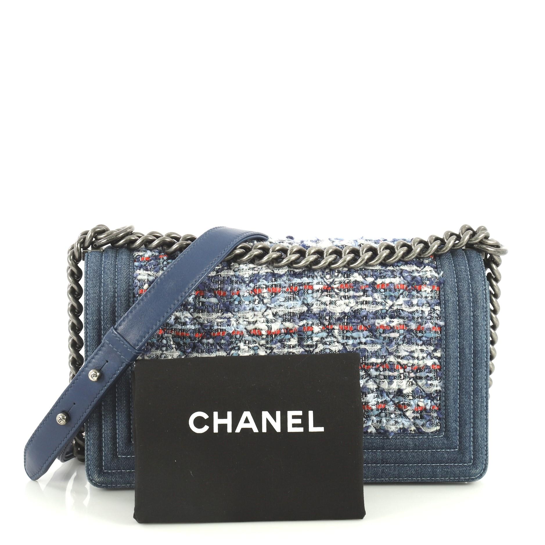 This Chanel Boy Flap Bag Braided Tweed and Lambskin with Denim Old Medium, crafted from blue braided tweed and lambskin leather, features chain link strap with shoulder pad and aged silver-tone hardware. Its CC boy push lock closure opens to a blue