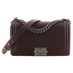 Chanel Boy Flap Bag Chevron Kalbsleder Old Medium