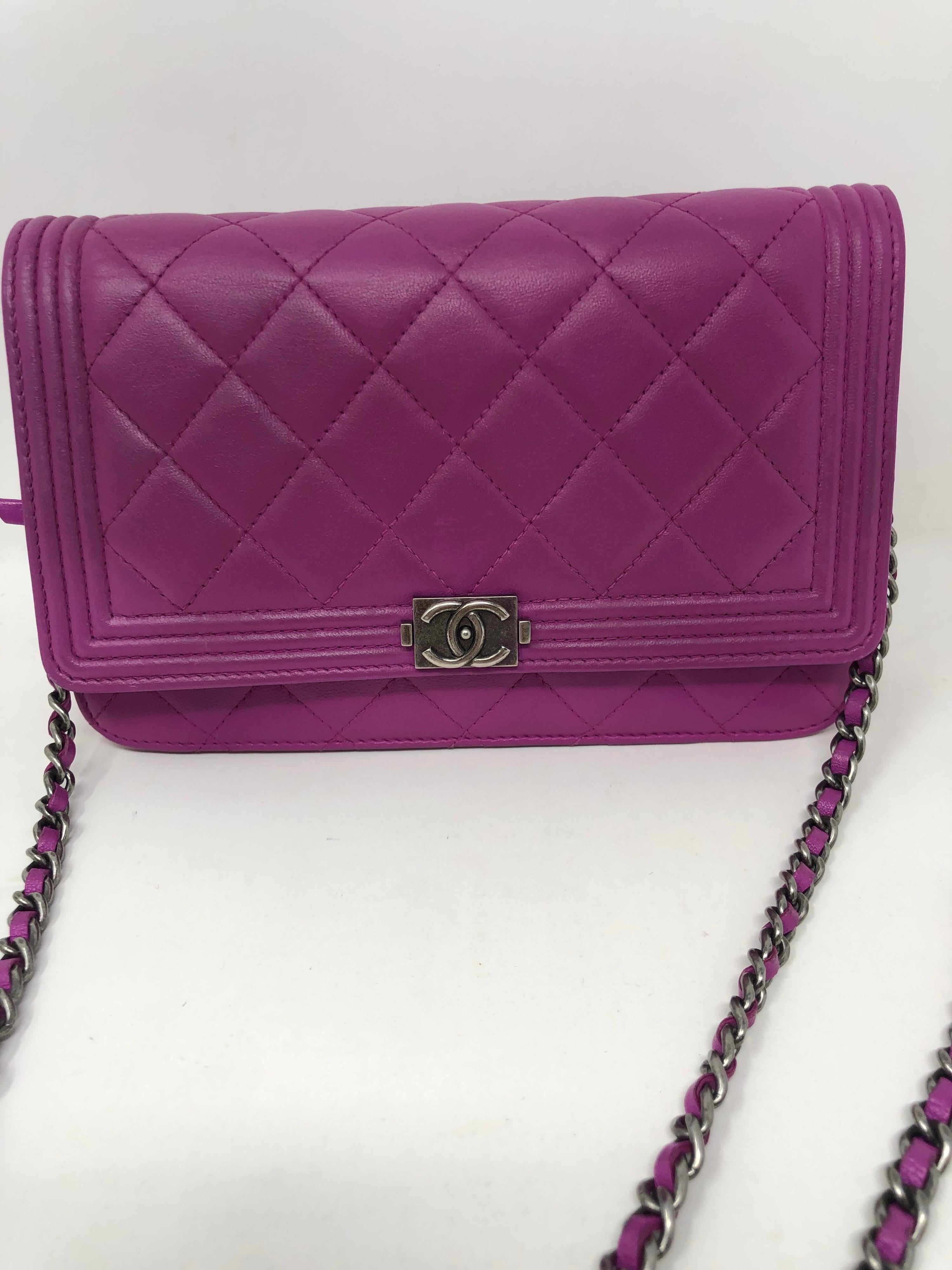 Chanel Boy Fuschia Wallet On A Chain Bag. Ruthenium hardware. Excellent condition. Crossbody or clutch. Includes dust cover. Guaranteed authentic. 