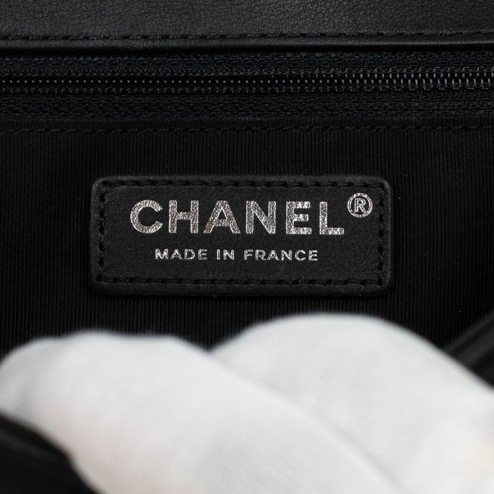 CHANEL, Boy in black leather For Sale 1