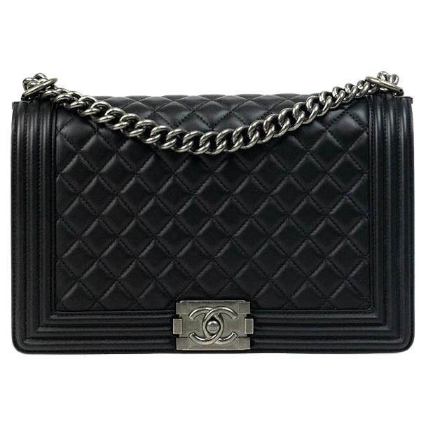 CHANEL, Boy in black leather For Sale