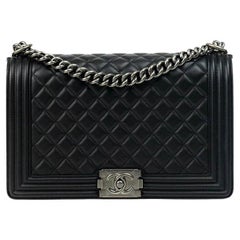CHANEL, Boy in black leather