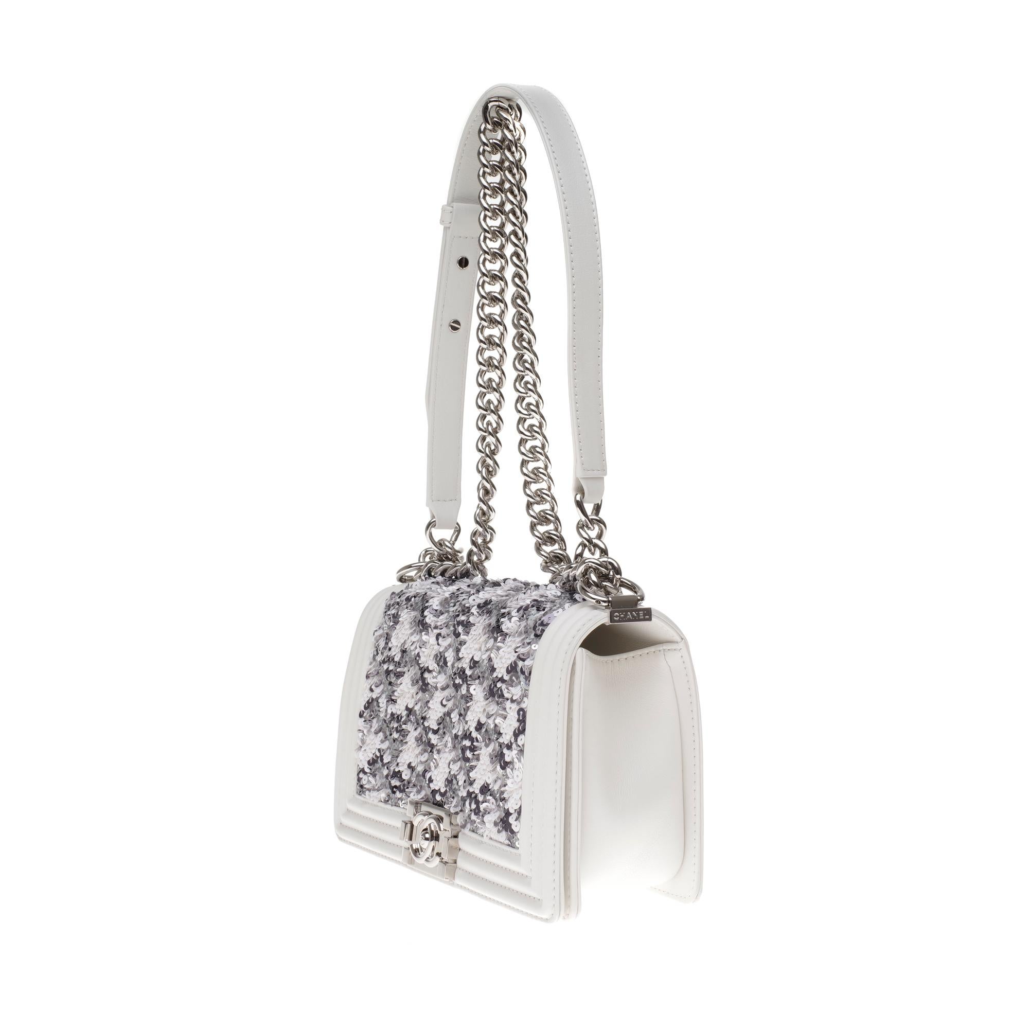 white bag with silver hardware
