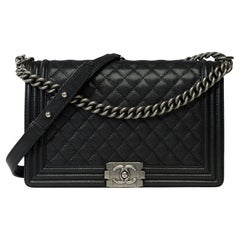 Chanel Boy New medium shoulder bag in black caviar quilted leather, SHW !