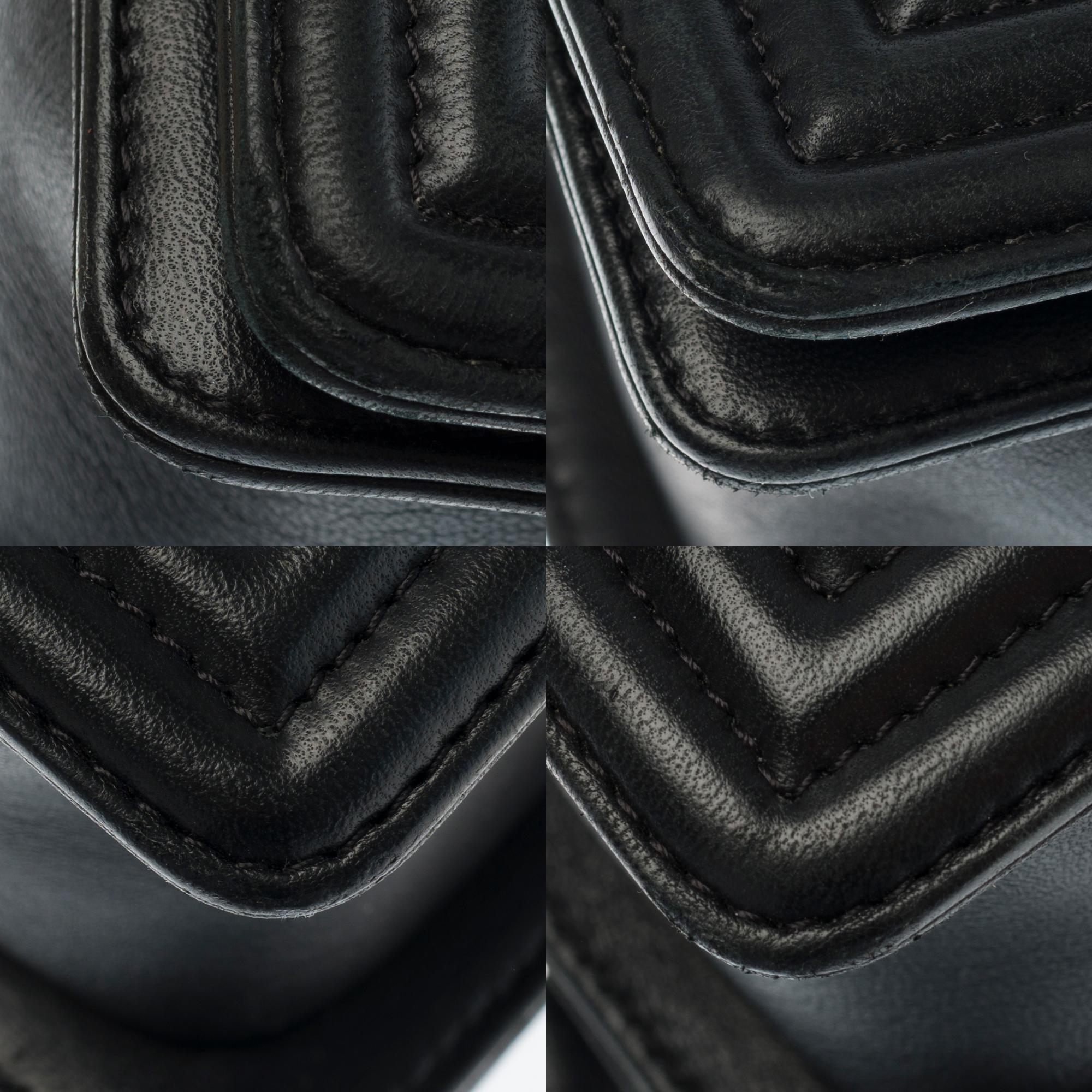 Chanel Boy Old medium shoulder bag in black quilted leather, silver hardware 2