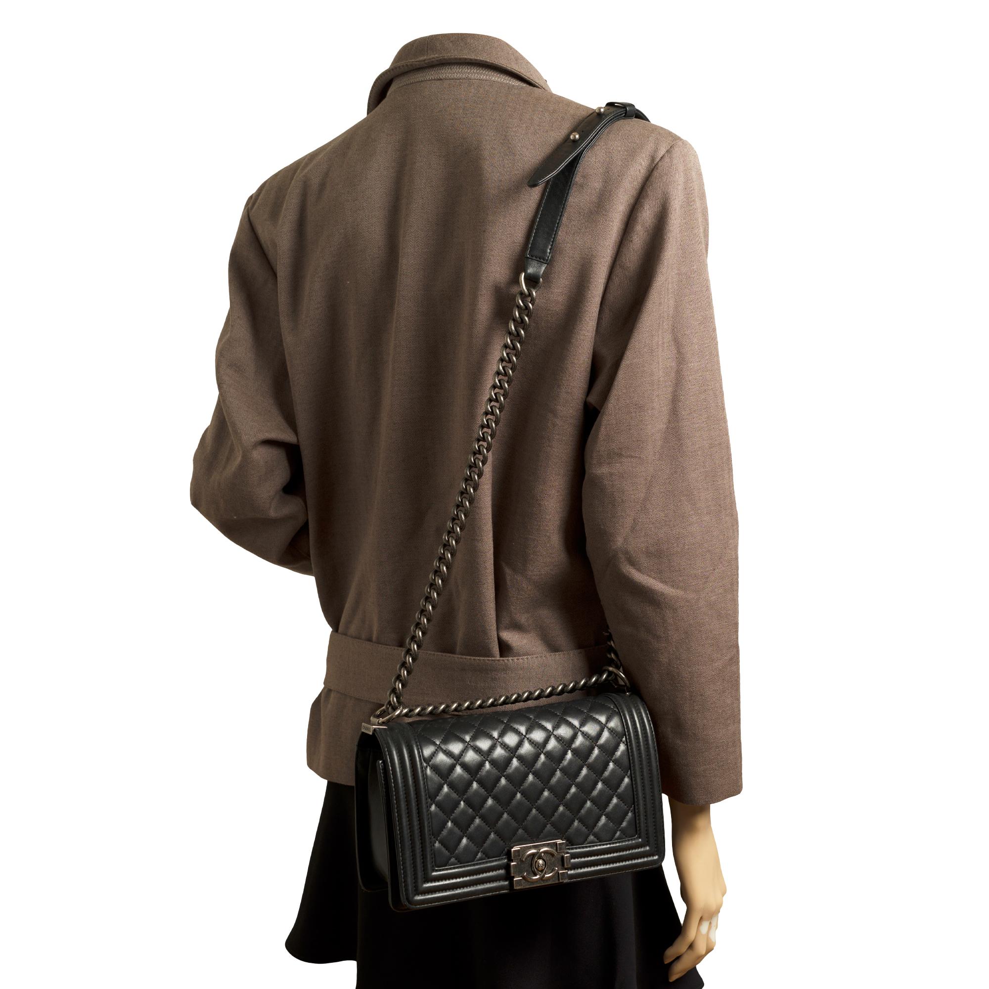 Chanel Boy Old medium shoulder bag in black quilted leather, silver hardware 3