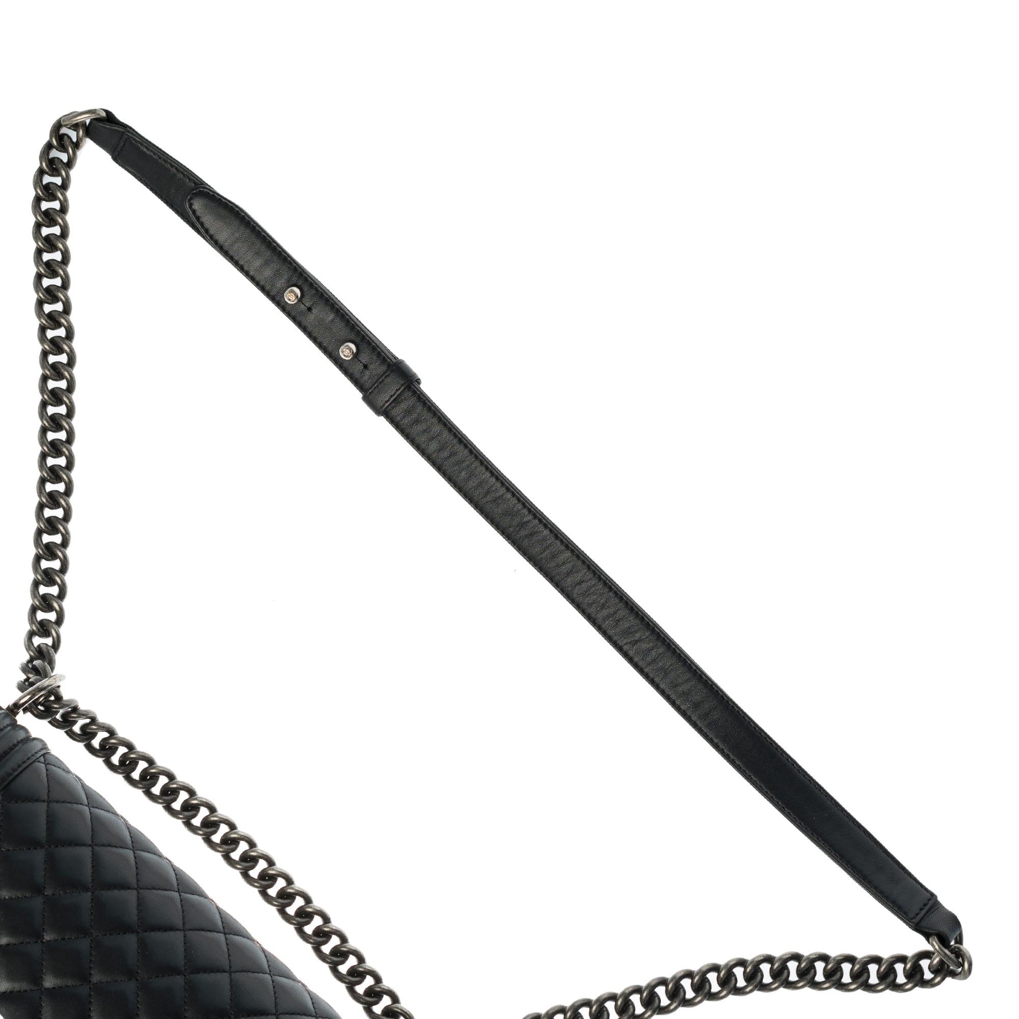 Women's Chanel Boy Old medium shoulder bag in black quilted leather, silver hardware