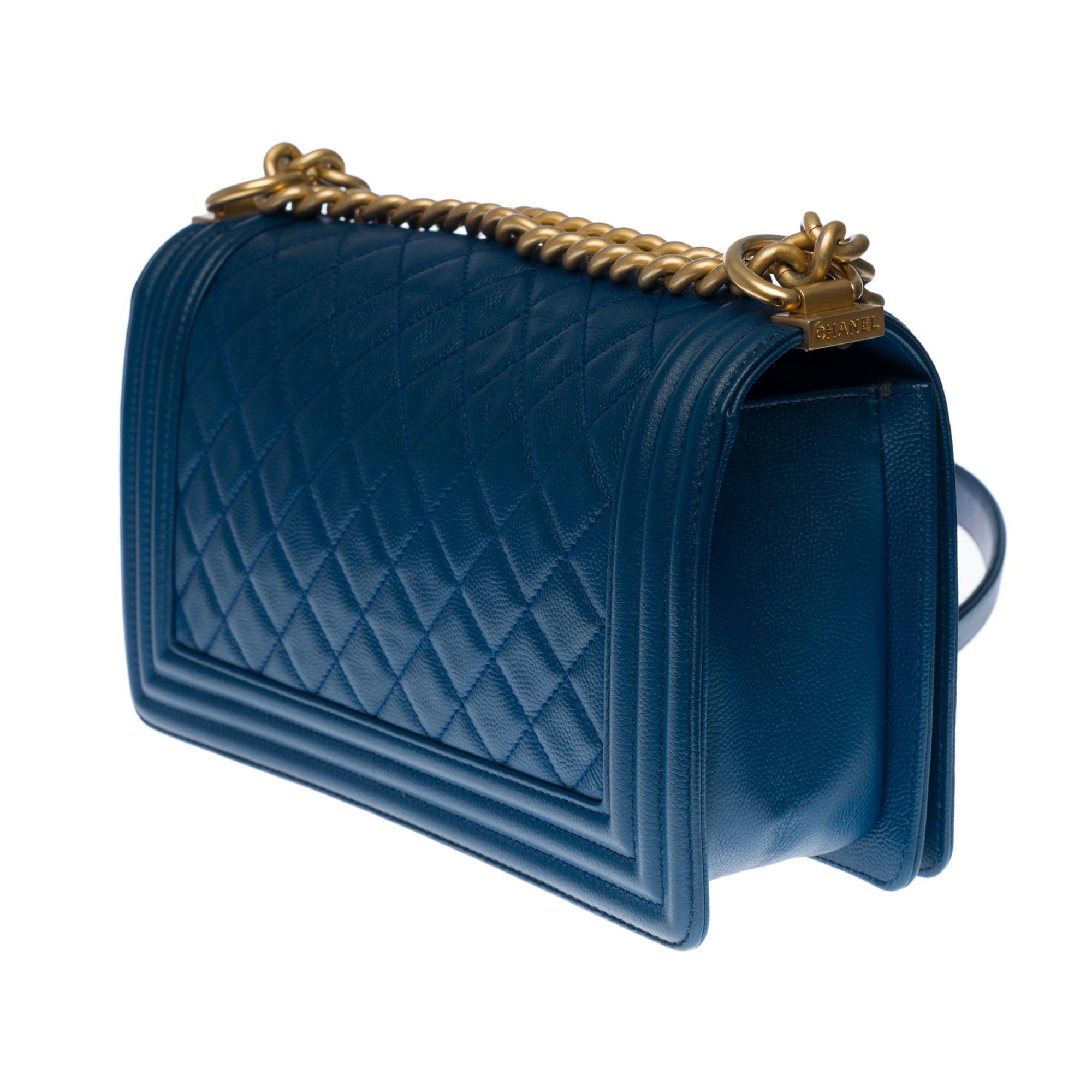 Blue Chanel Boy Old medium shoulder bag in blue caviar leather, matte gold hardware