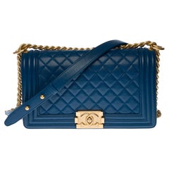 Chanel Boy Old medium shoulder bag in blue caviar leather, matte gold hardware