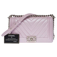 Used Chanel Boy Old Medium shoulder bag in lilac quilted herringbone leather, SHW