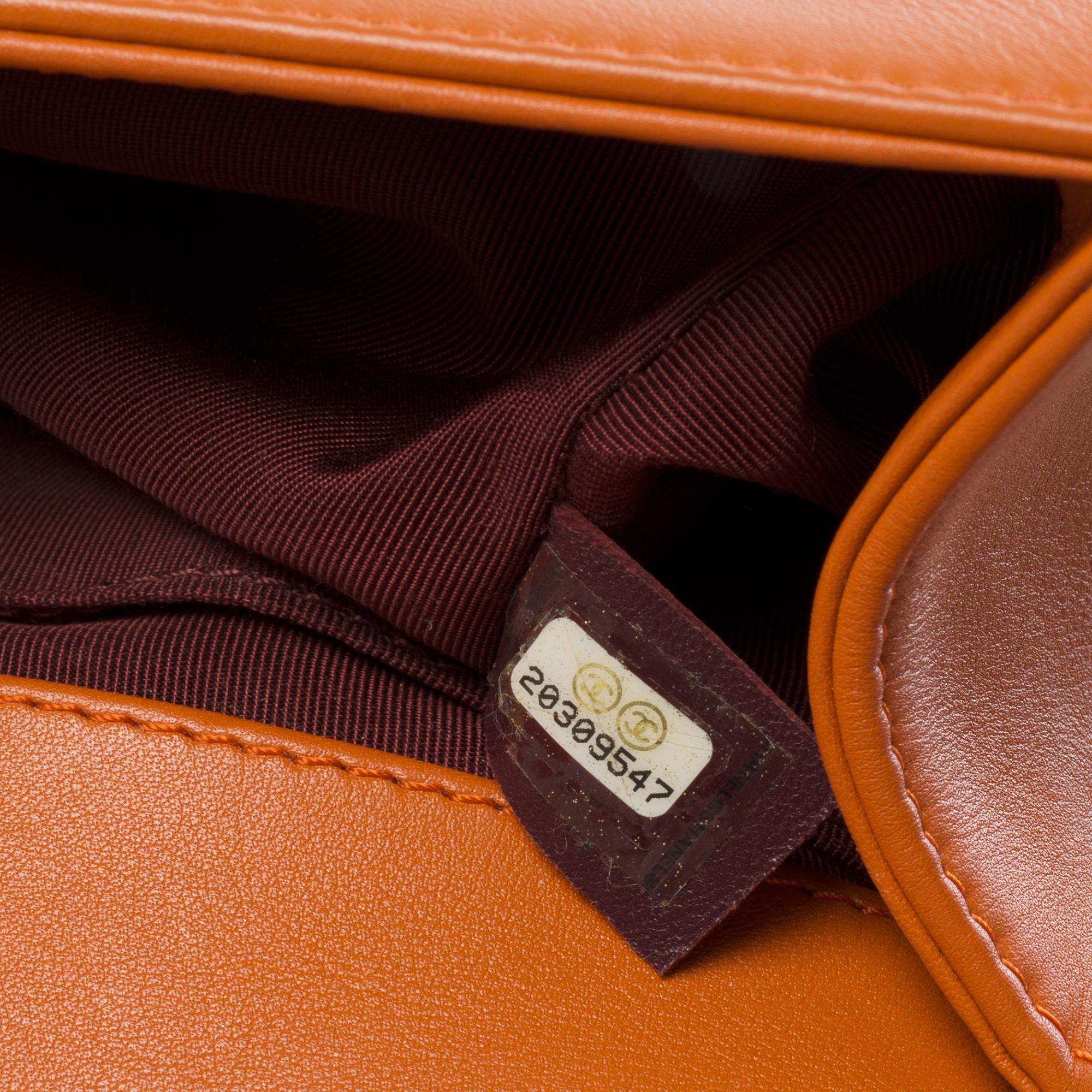 Brown Chanel Boy Old medium shoulder bag in navy blue quilted leather, silver hardware