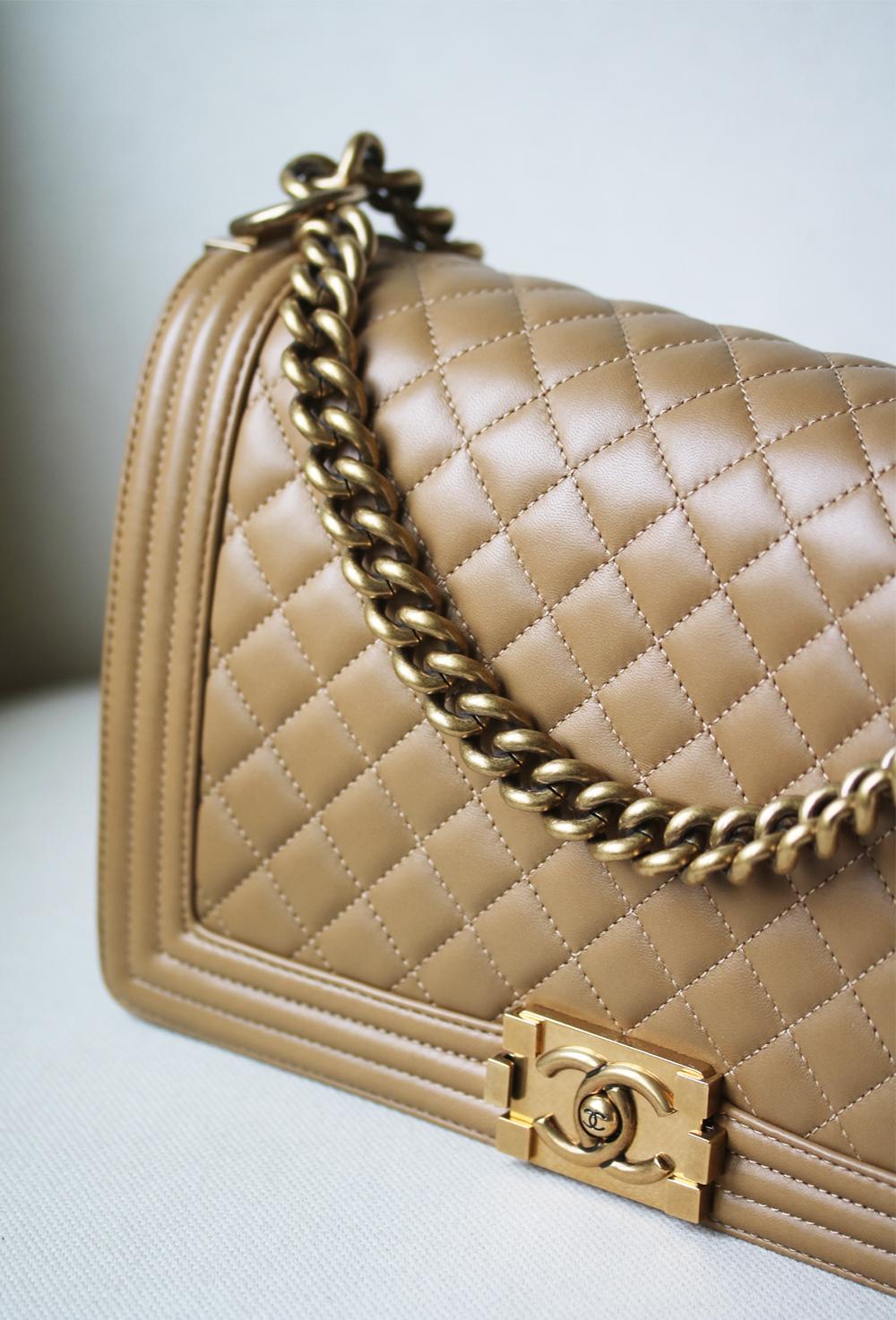 Chanel Quilted Leather Boy Bag. Adjustable shoulder strap in leather and matte gold-tone metal. Features coffee colour leather. Tonal canvas lining. Flap compartments. Zip interior pocket. Made in Italy. Does not come with a dustbag or box.