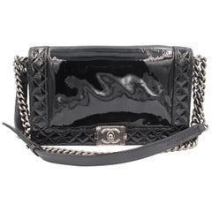 Chanel boy reverso in black patent leather