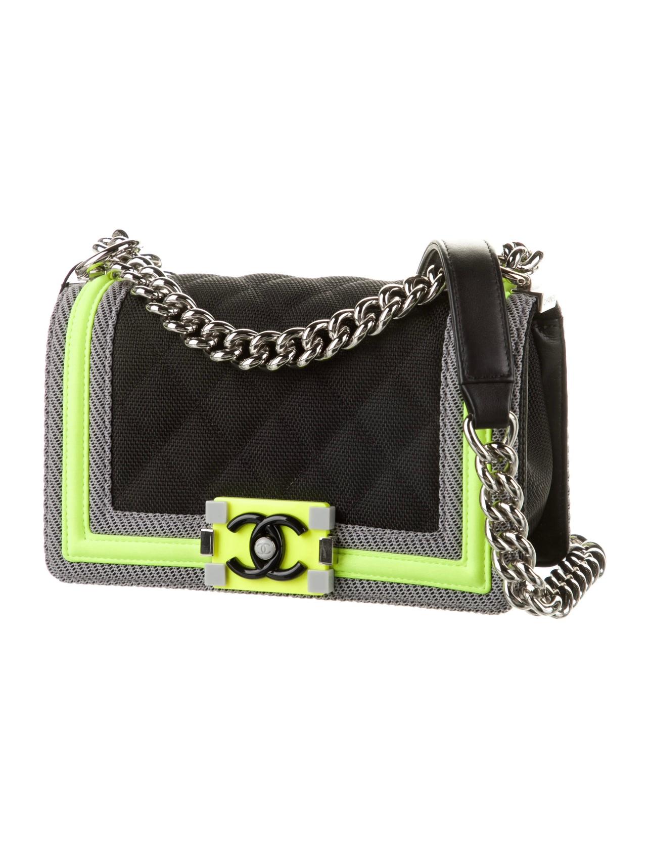 Chanel Limited Edition Spring 2016 RTW  Small Neon Lime Sport Boy Bag

Year: 2016 Spring Ready to Wear
Chain-link strap
Silver-tone hardware accents.
Boy push-lock closure
Black fluo nylon interior
Interior slip pocket
8