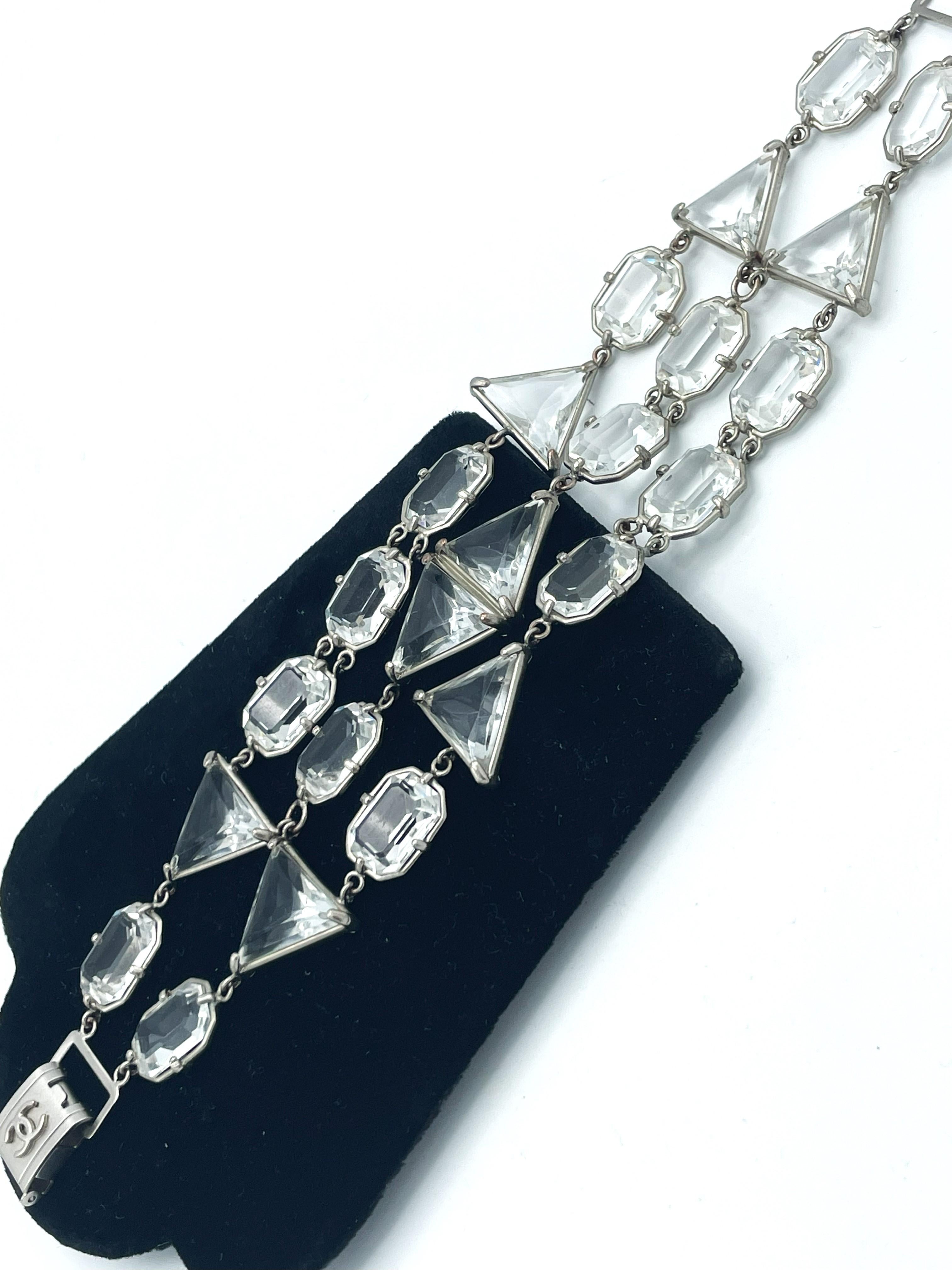 CHANEL BRACELET, 3 rows of faceted crystals, logo closure, signed. 1998 P  For Sale 1