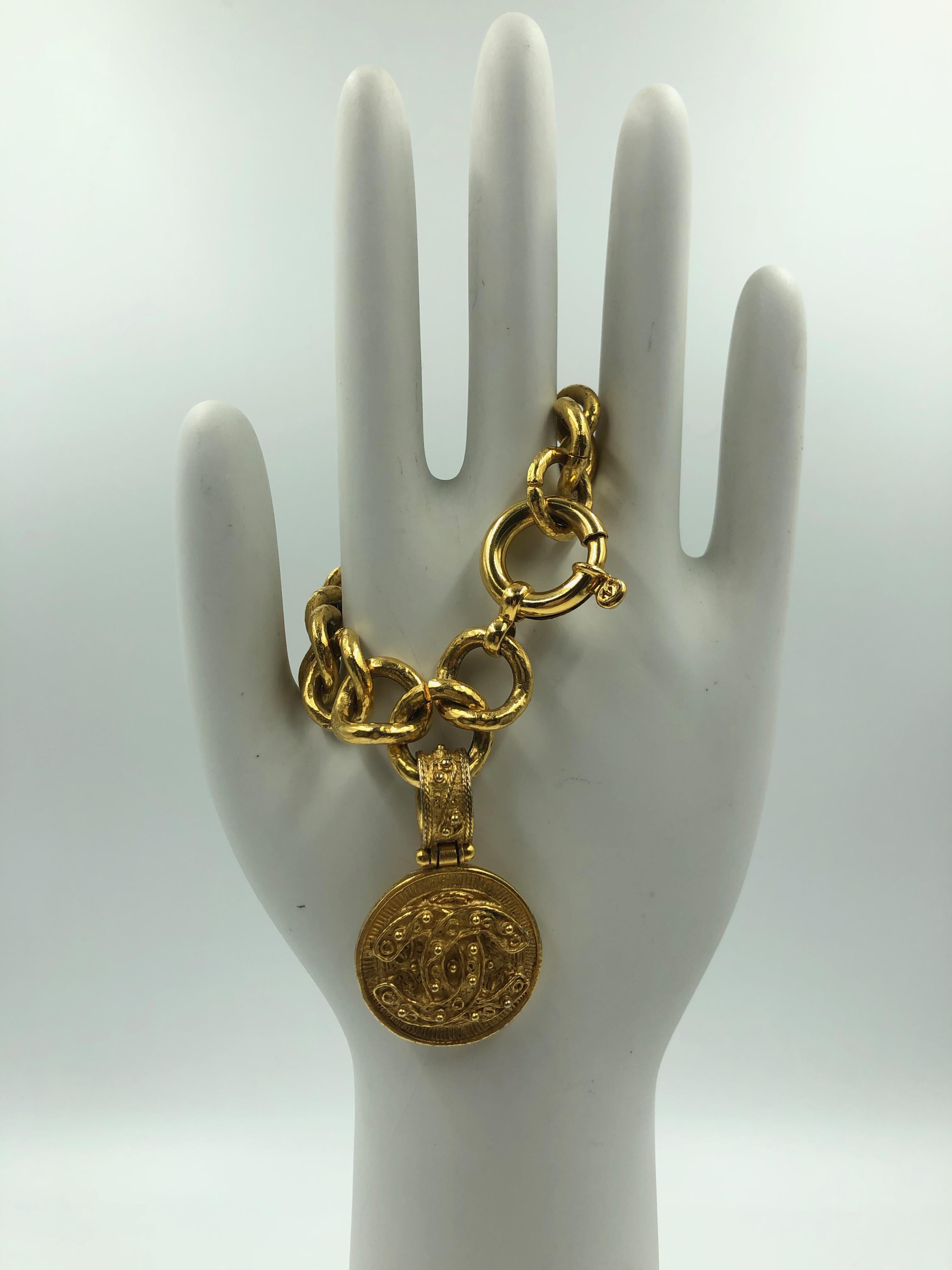 Chanel CC Logo Bracelet Gold Tone Filigree with a Hanging CC Medallion In Good Condition In Los Angeles, CA