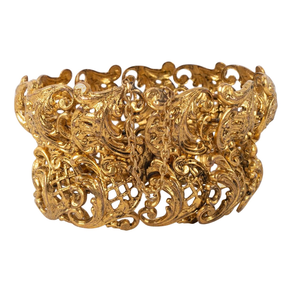 Chanel Bracelet haute couture ajouré en métal doré