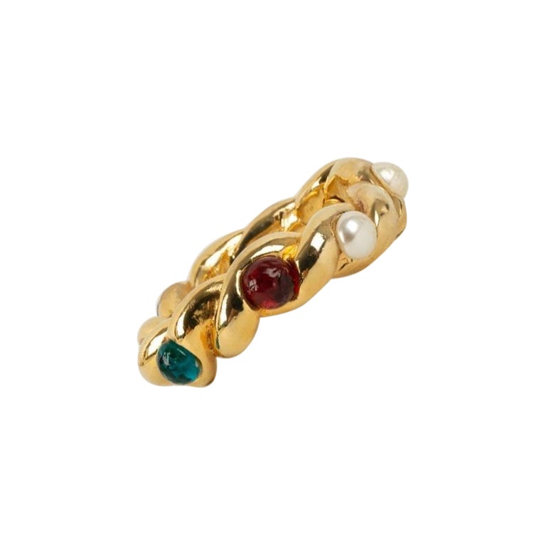 Bracelet Chanel en métal doré et pâte de verre en vente