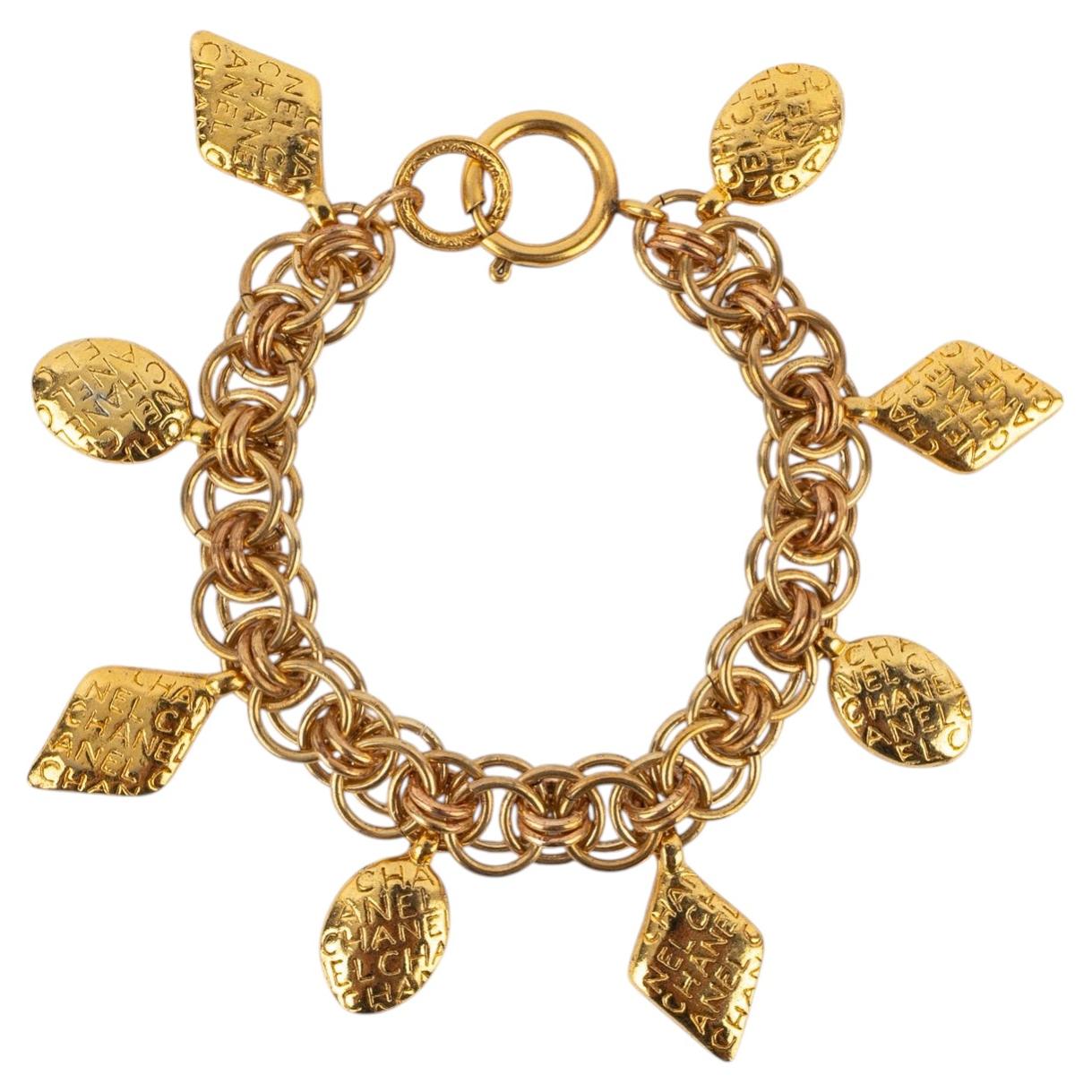 Chanel bracelet with charms by Karl Lagerfeld circa late 1980s For Sale