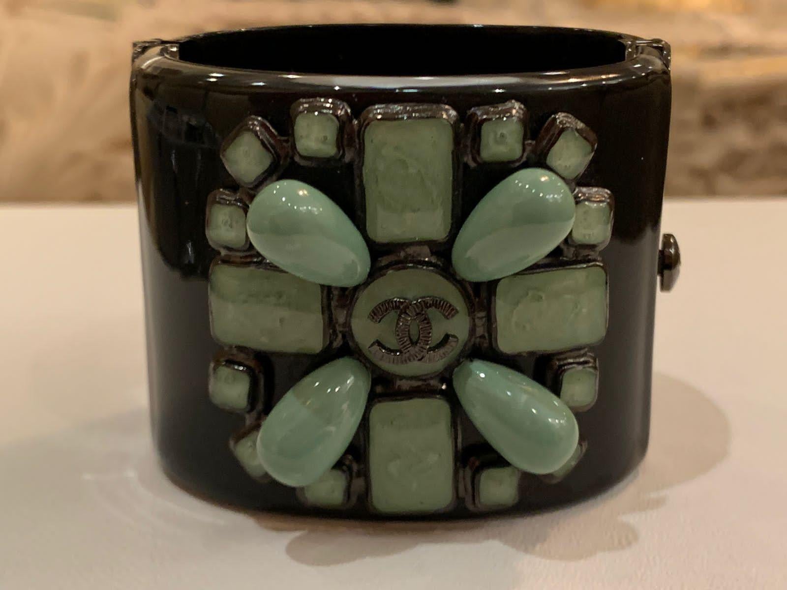 Chanel bracelet with green stones. Comes with dust bag and box. Excellent pre loved condition.