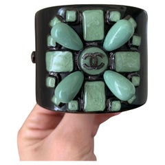 Chanel bracelet with green stones