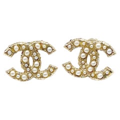 Chanel Brand New Gold CC Seed Pearl Flower Small Piercing Earrings For Sale  at 1stDibs