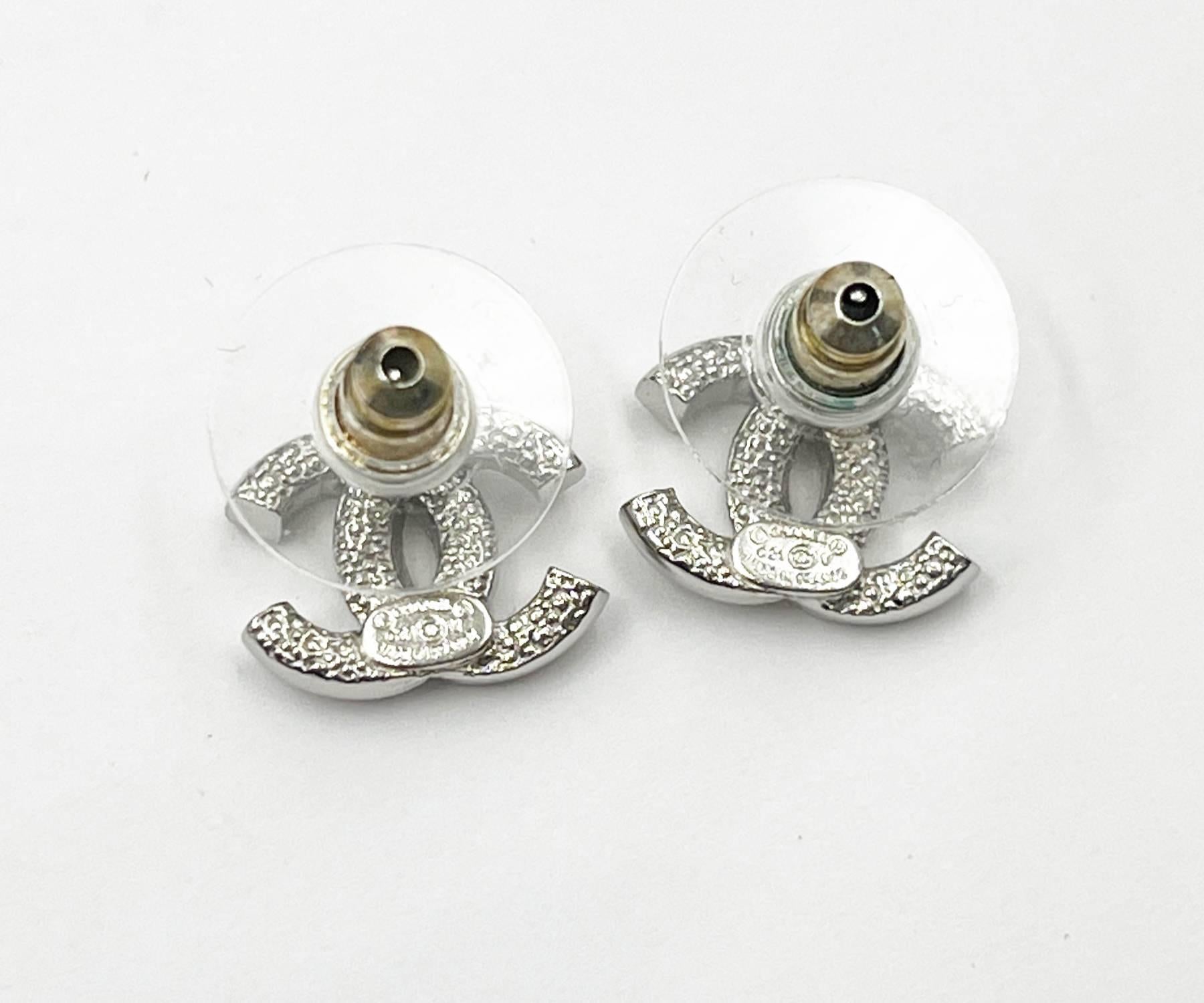 Chanel Brand New Classic Silver CC Crystal Reissued Piercing Earrings In Excellent Condition For Sale In Pasadena, CA