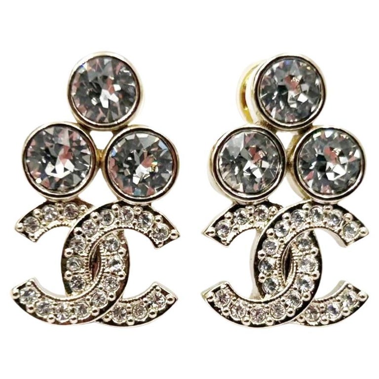 CHANEL CC Stud Earrings in Pale Gilded Metal at 1stDibs  silver chanel  stud earrings, chanel diamond stud earrings, chanel double c diamond  earrings