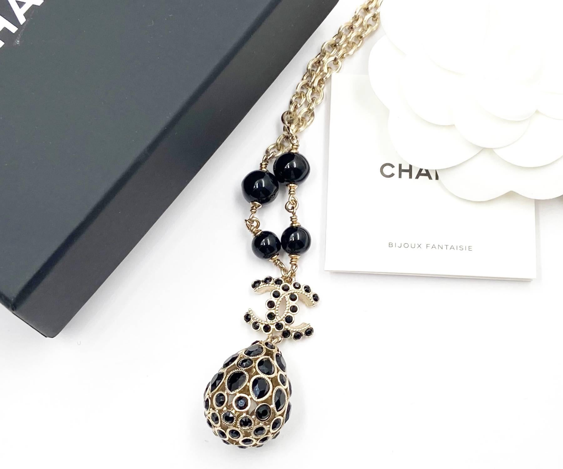 Chanel Brand New Gold CC Black Stone Crystal Tear Drop Pendant Necklace

*Marked 20
*Made in France
*Comes with the original box, pouch, booklet, camellia and ribbon
*Brand New

-It's approximately 18 to 22