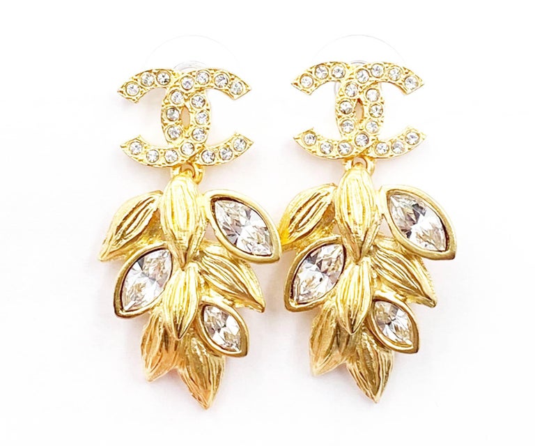 Chanel Brand New Gold CC Crystal Olive Leaf Dangle Piercing Earrings For  Sale at 1stDibs