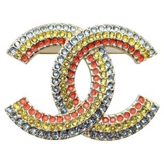 Chanel Brand New Gold CC Rainbow Blue Yellow Pink Brooch at 1stDibs