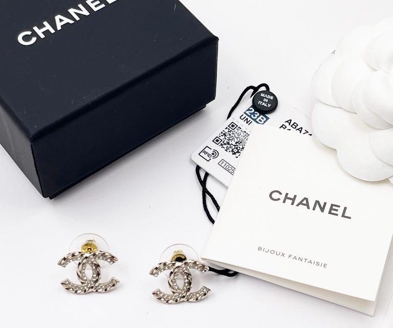 Chanel Brand New Gold Twisted Crystal Piercing Earrings For Sale at 1stDibs