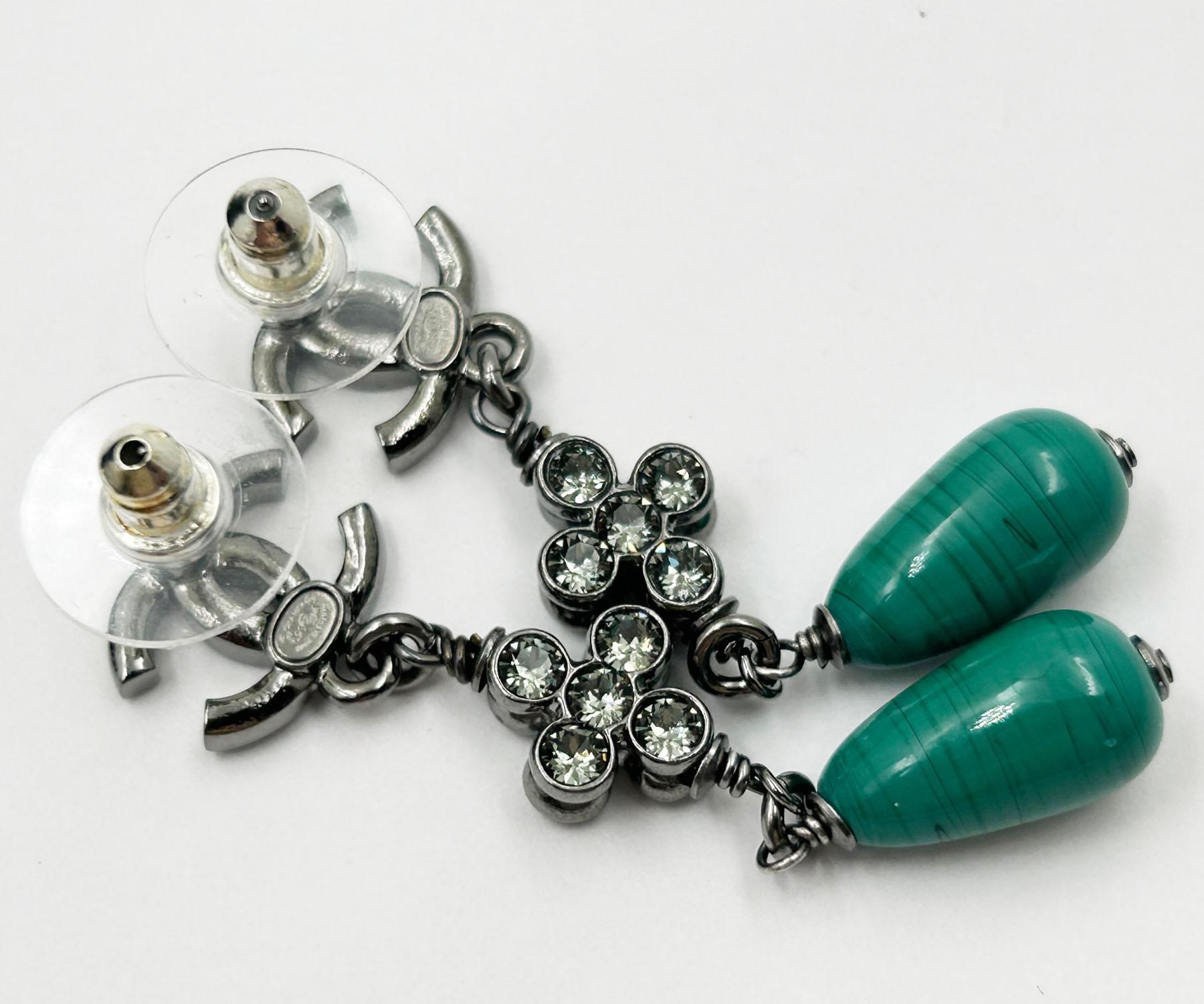 Chanel Brand New Gunmetal CC Crystal Green Stone Long Piercing Earrings In New Condition For Sale In Pasadena, CA