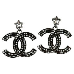 Chanel Brand New Gunmetal Star CC Dangle Piercing Earrings
