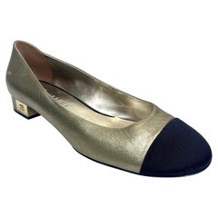 Chanel Ballerines bronze et noires avec détails CC dorés Taille 40.5