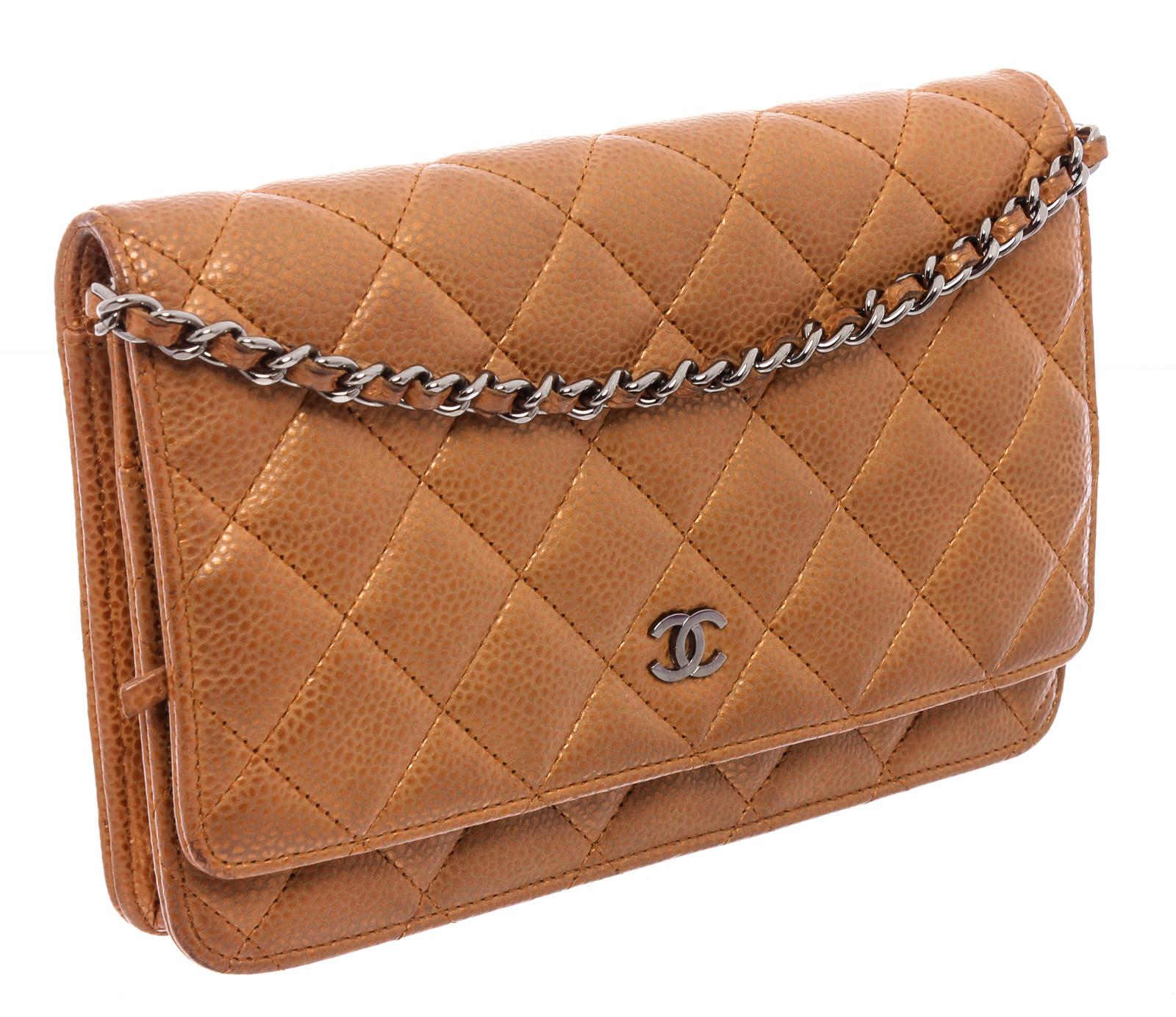 Bronze caviar quilted leather Chanel Classic Wallet On Chain with silver-tone hardware, single chain-link and leather shoulder strap, interlocking 'CC' adornment at front flap, single patch pocket at back, dual pockets at front flap underside; one