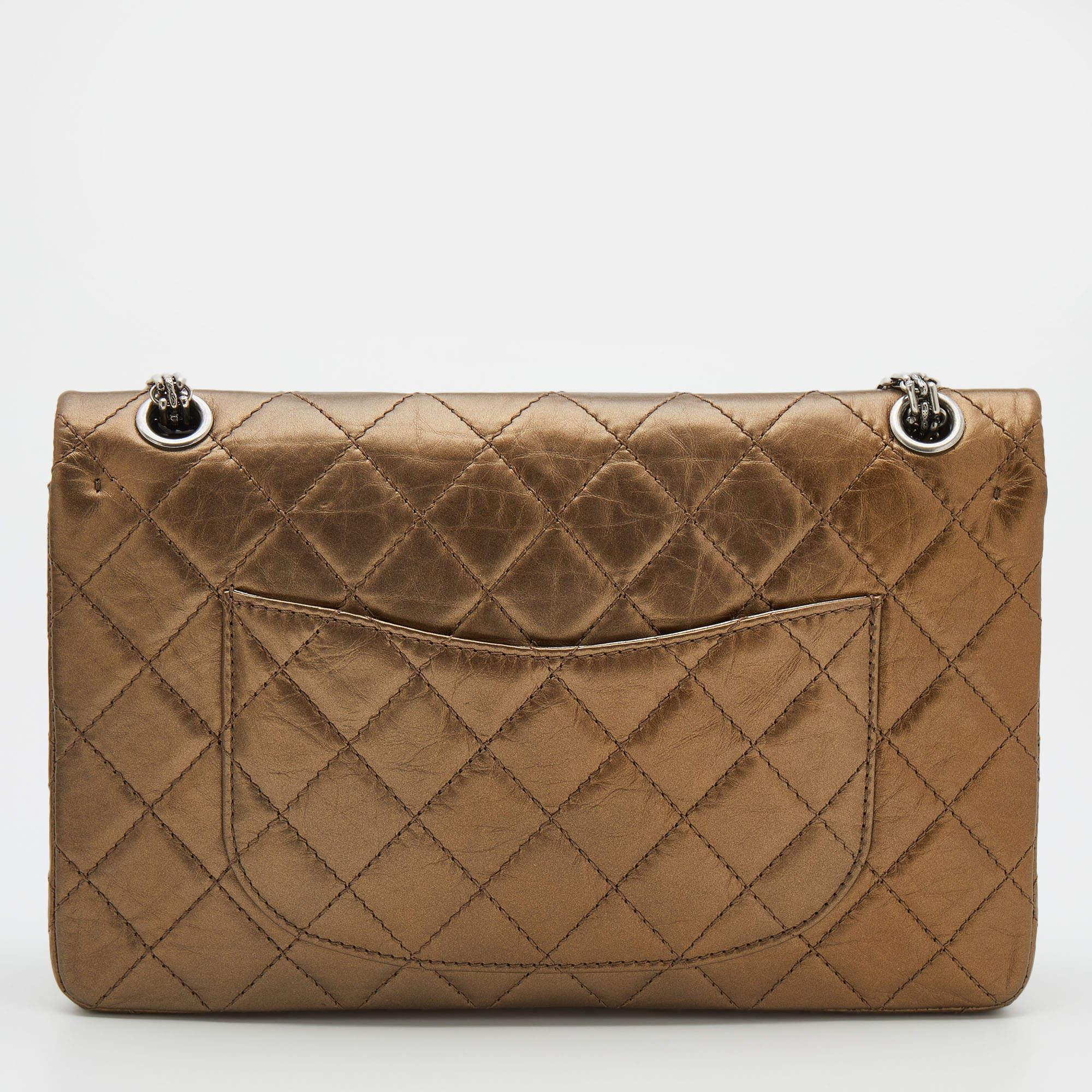 Introduce Chanel's irreplaceable style to your closet with this Reissue 225 Flap bag. Crafted using bronze leather, the bag has a signature quilted exterior, the Mademoiselle lock on the front, and a leather-lined interior. Complete with a chain
