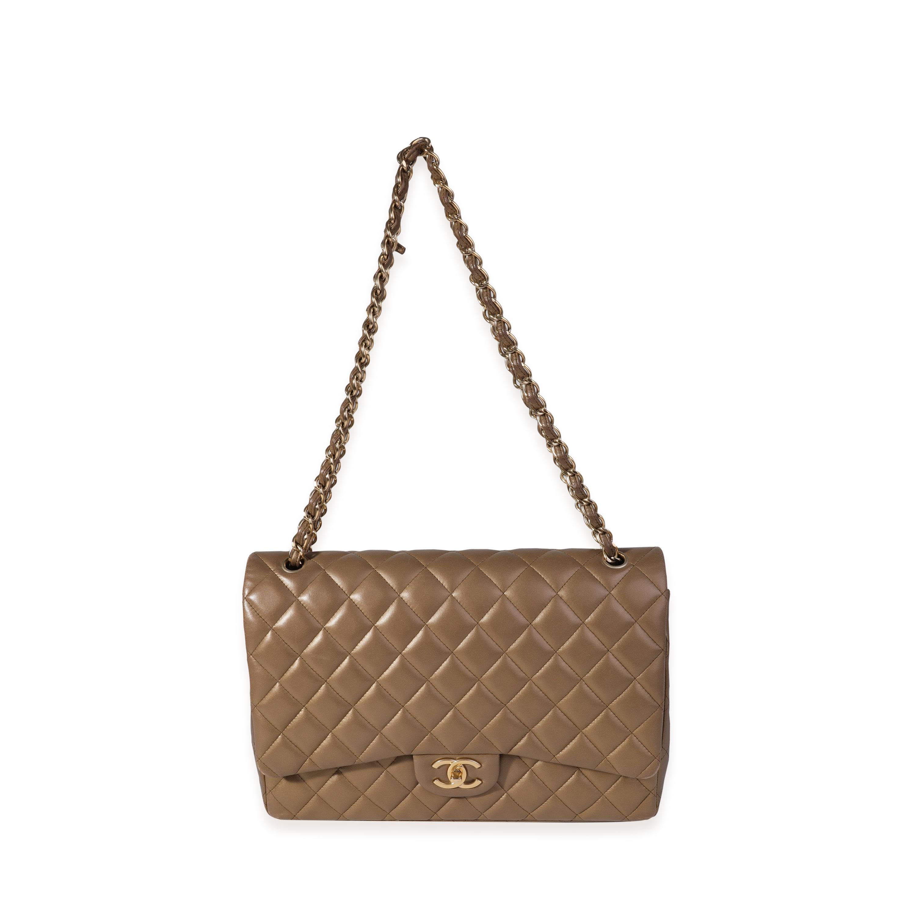 Titolo dell'elenco: Borsa Chanel bronzo trapuntata in pelle d'agnello Maxi Classic con doppia patta
SKU: 120827
MSRP: 10000.00
Condizioni: Usato 
Condizioni della borsa: Buono
Commenti sulle condizioni: Buone condizioni. Graffi agli angoli e