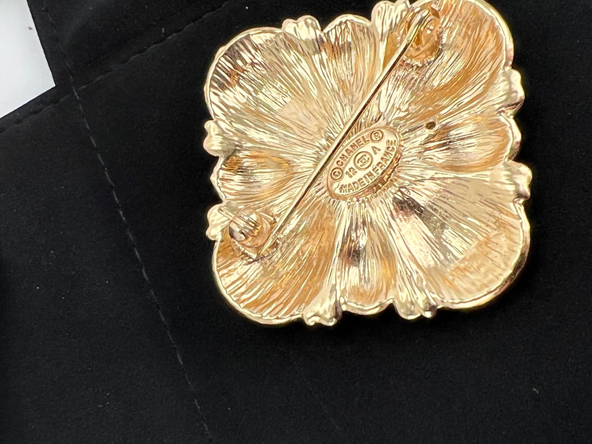 Chanel Brooch Black Stone Faux Pearl Golden Brooch Pin charm at 1stDibs