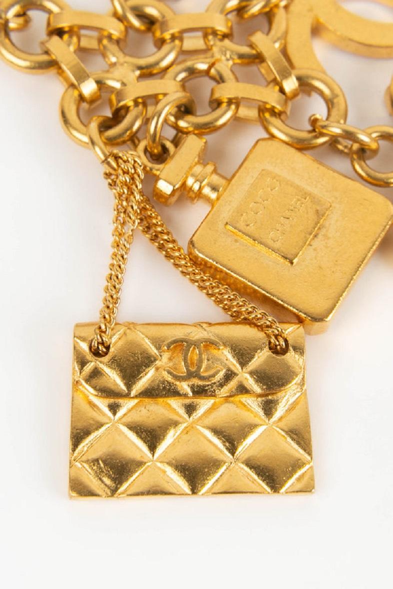 Chanel, breloques broche en métal doré, 1995 Unisexe en vente